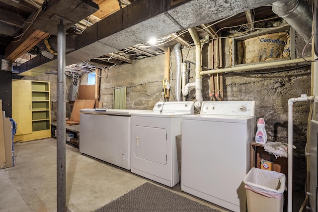 laundry area featuring laundry area and washing machine and clothes dryer