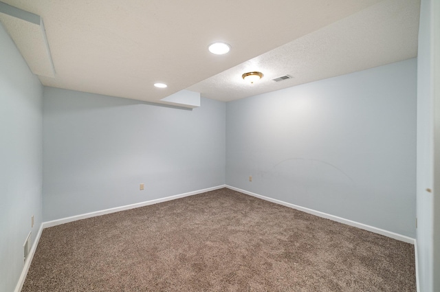 carpeted empty room with recessed lighting, visible vents, baseboards, and a textured ceiling