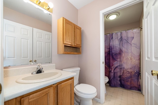 bathroom featuring tile patterned floors, curtained shower, toilet, and vanity