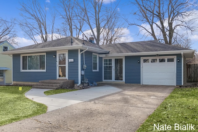 single story home with driveway, a front lawn, roof with shingles, an attached garage, and a chimney