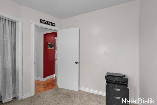 interior space featuring baseboards