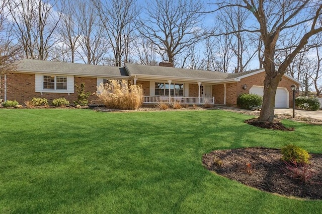 single story home featuring brick siding, a front lawn, a porch, concrete driveway, and an attached garage