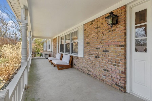 view of patio featuring a porch