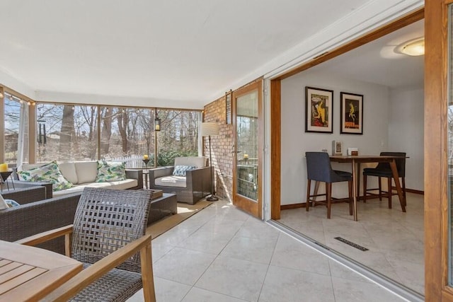 sunroom / solarium featuring visible vents