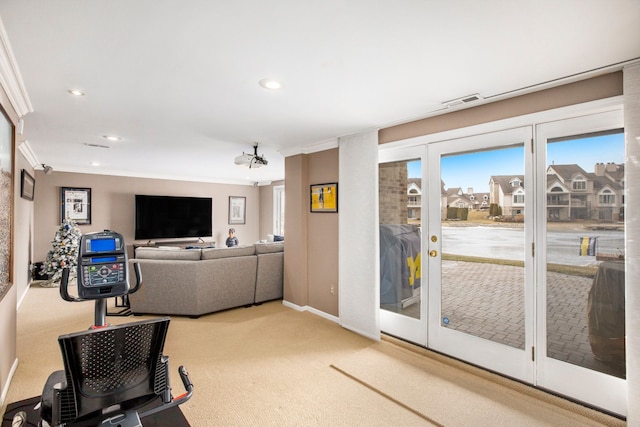 living room featuring carpet, visible vents, recessed lighting, ornamental molding, and french doors