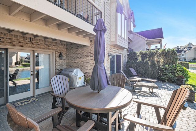 view of patio / terrace featuring a balcony and area for grilling