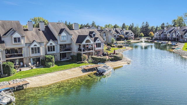 view of water feature with a residential view