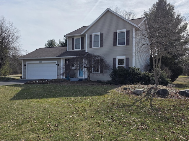 traditional-style home with a front lawn, a garage, and driveway