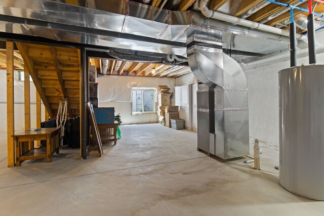 below grade area with water heater and stairway