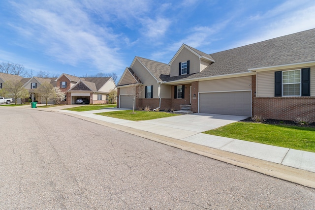 view of front of house with a front lawn, a residential view, concrete driveway, a garage, and brick siding