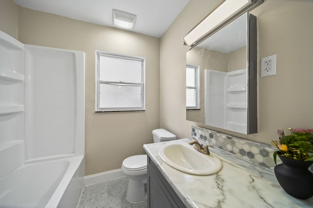 full bath with vanity, toilet, and baseboards