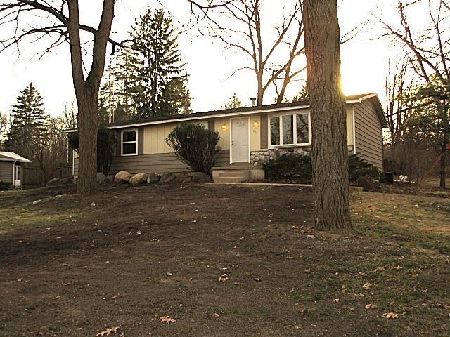 view of front of house featuring stone siding