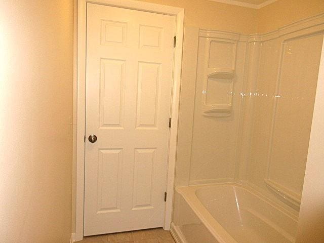 bathroom with shower / bathtub combination