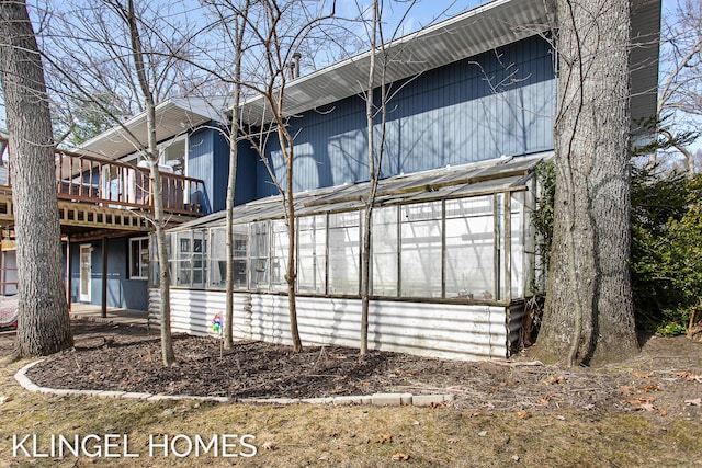 exterior space with a wooden deck