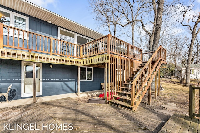 exterior space featuring stairway and a patio