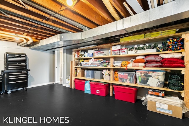 unfinished basement featuring baseboards