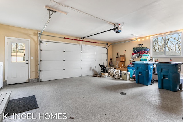 garage featuring a garage door opener