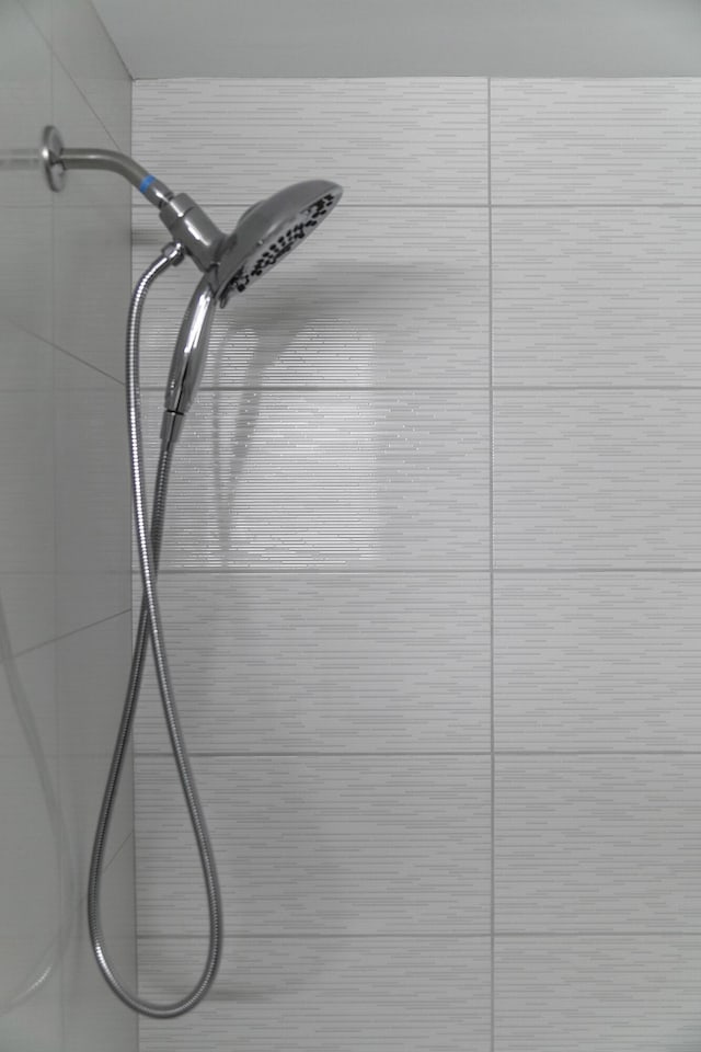 room details with a tile shower