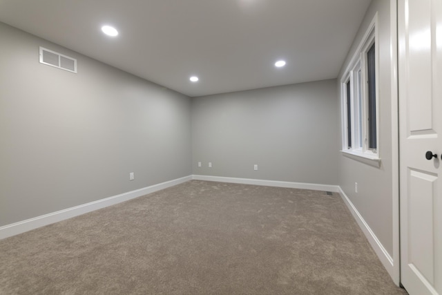 interior space with recessed lighting, visible vents, baseboards, and carpet flooring