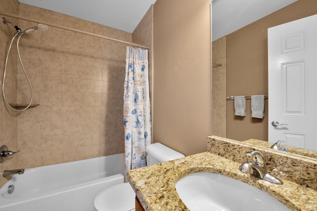 bathroom with shower / tub combo with curtain, vanity, and toilet