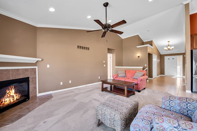 living room with visible vents, baseboards, carpet, and crown molding