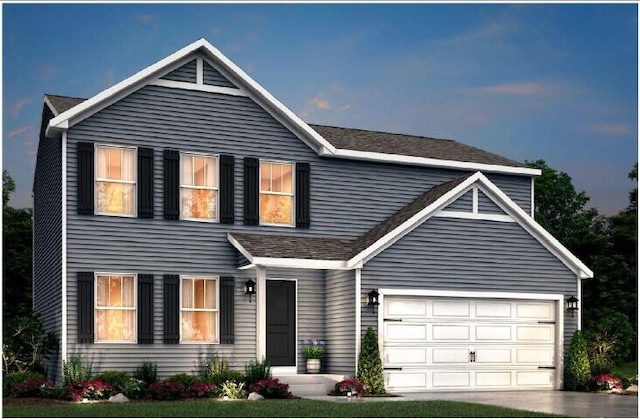 view of front of home with a shingled roof and a garage