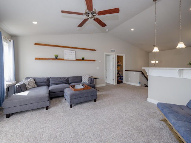 living room with baseboards, visible vents, carpet floors, ceiling fan, and vaulted ceiling