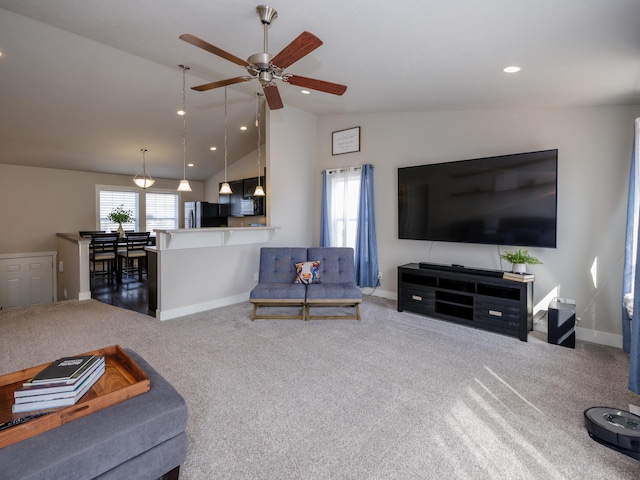 carpeted living room featuring recessed lighting, baseboards, a ceiling fan, and vaulted ceiling