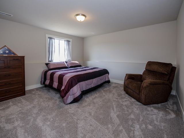 bedroom featuring carpet, visible vents, and baseboards