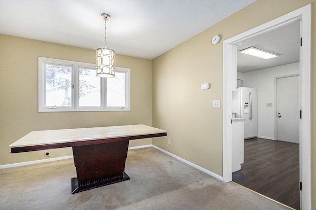 unfurnished office with carpet and baseboards