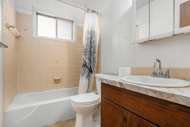 bathroom with tile patterned floors, toilet, shower / bath combo, and vanity