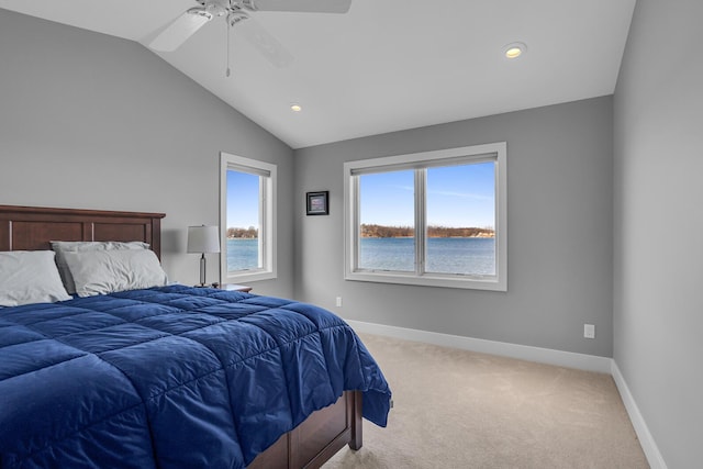 carpeted bedroom with recessed lighting, baseboards, lofted ceiling, and a ceiling fan