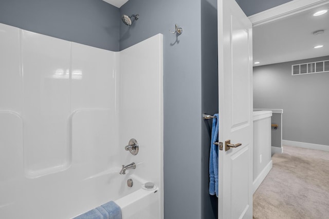 full bathroom featuring recessed lighting, washtub / shower combination, visible vents, and baseboards