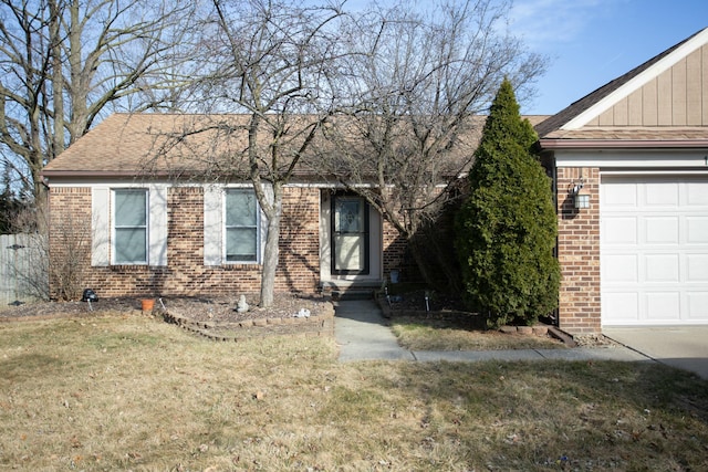 single story home featuring brick siding, a front yard, and roof with shingles