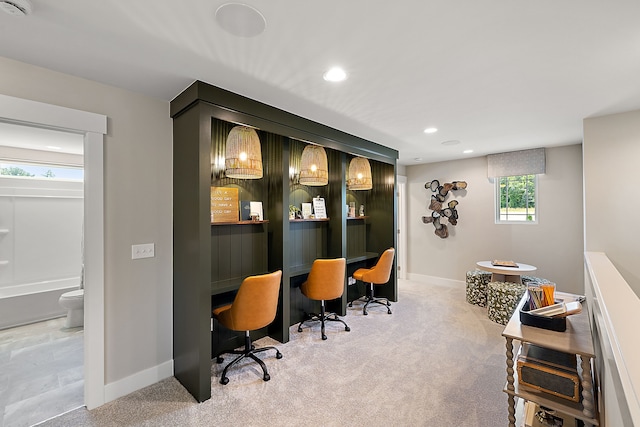 carpeted home office with recessed lighting, baseboards, and built in study area