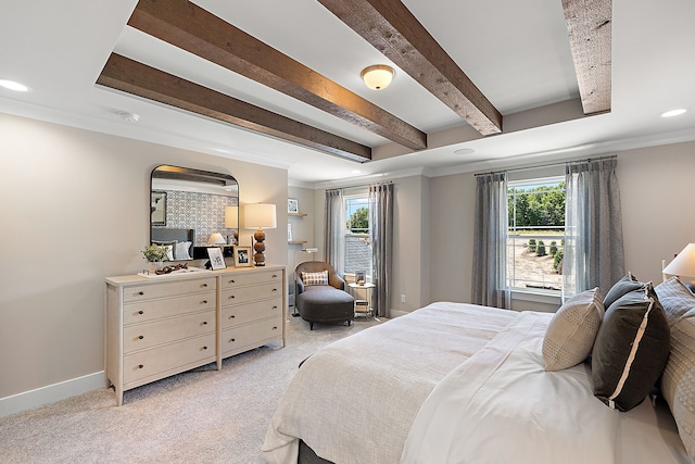 bedroom featuring beam ceiling, multiple windows, and light carpet