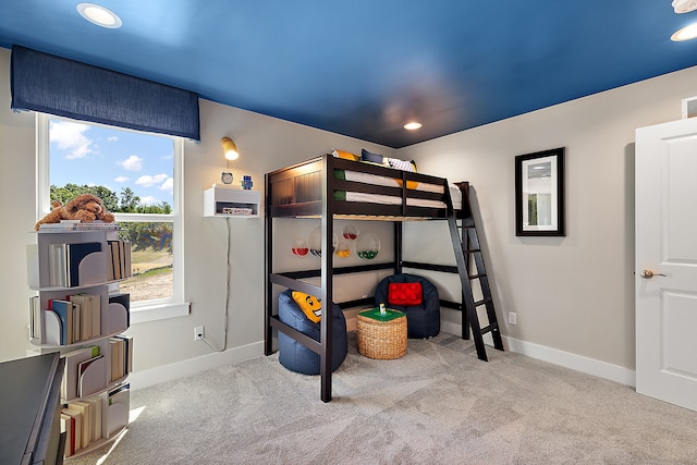 carpeted bedroom featuring recessed lighting, visible vents, and baseboards