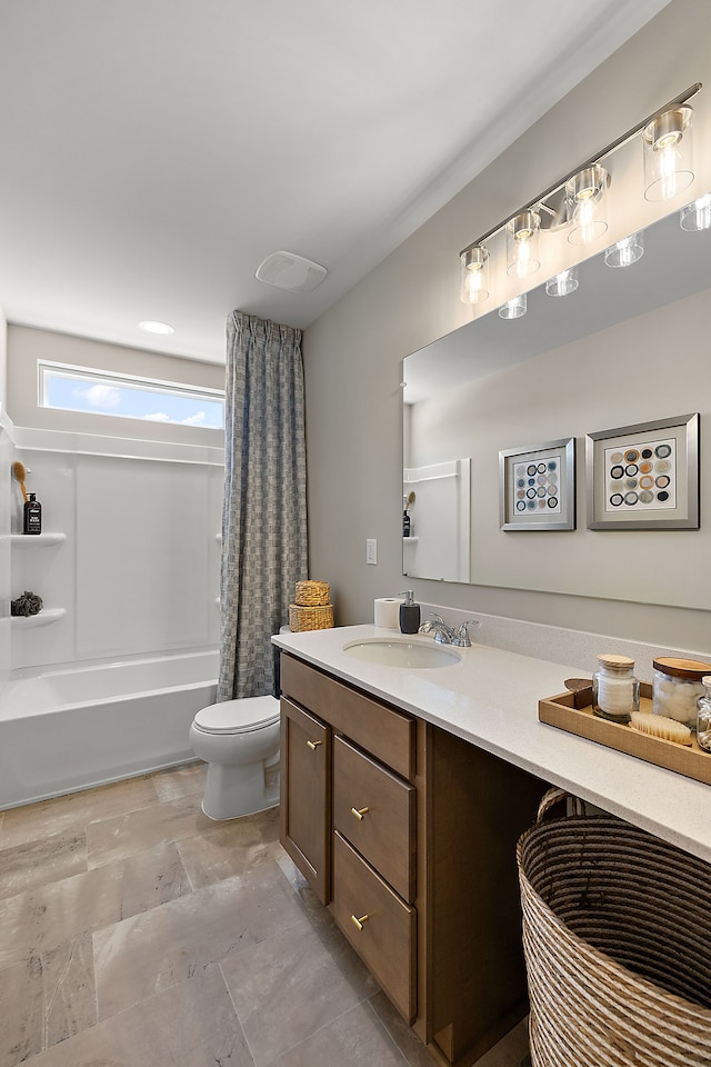 full bath featuring visible vents, toilet, vanity, and shower / bath combination with curtain