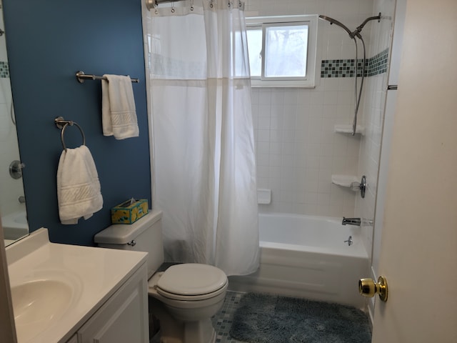 bathroom featuring shower / bath combination with curtain, vanity, and toilet