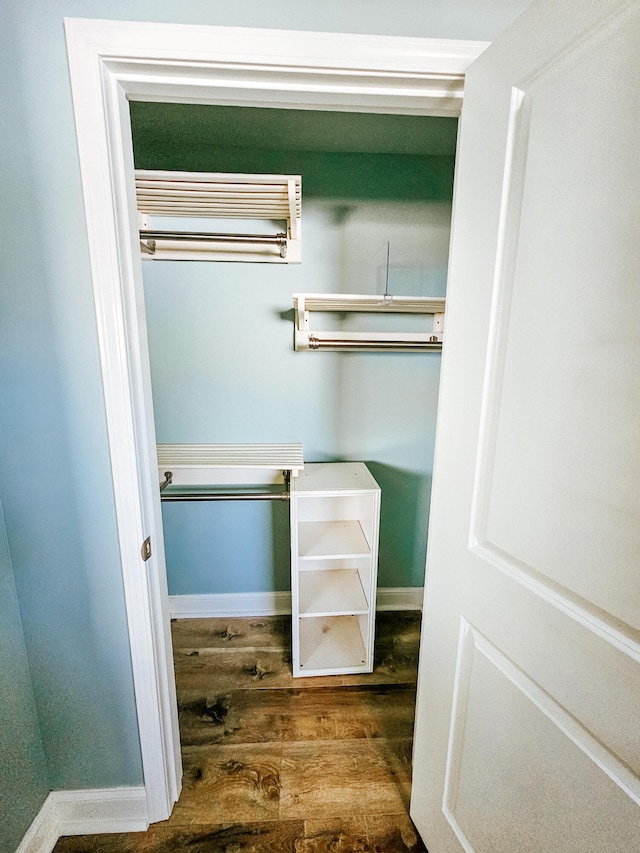 closet featuring a wall mounted air conditioner