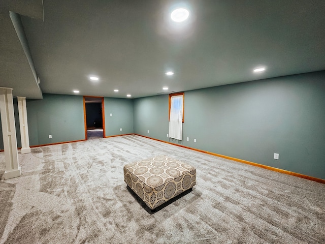 finished below grade area featuring recessed lighting, baseboards, and carpet floors