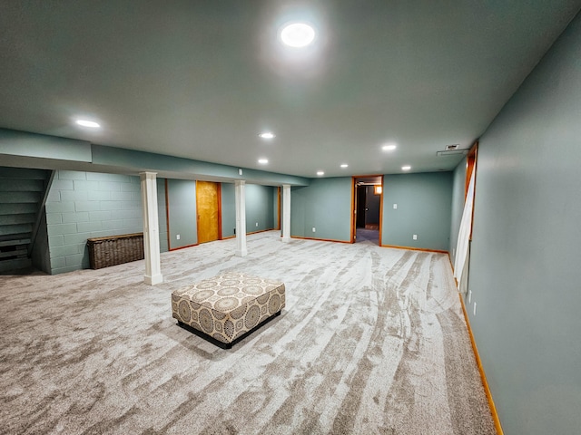 finished basement featuring recessed lighting, baseboards, and carpet floors