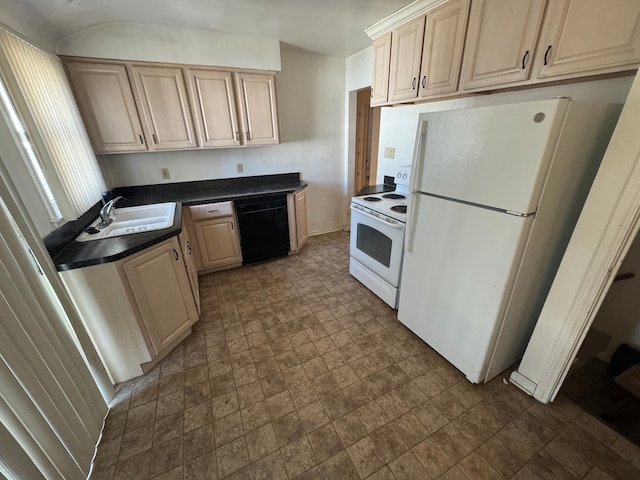 kitchen featuring white appliances, dark countertops, light brown cabinets, and a sink