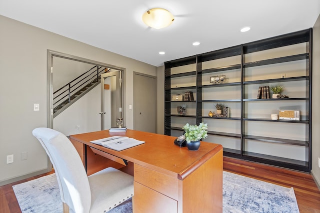 office with recessed lighting, wood finished floors, and baseboards