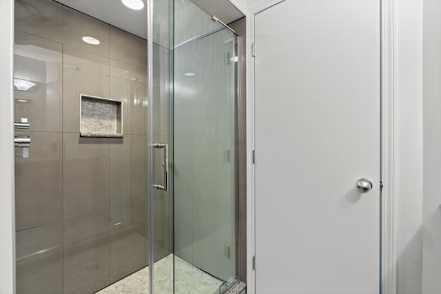 bathroom featuring a stall shower