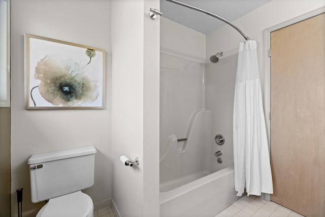 full bath featuring toilet, shower / tub combo, and tile patterned flooring