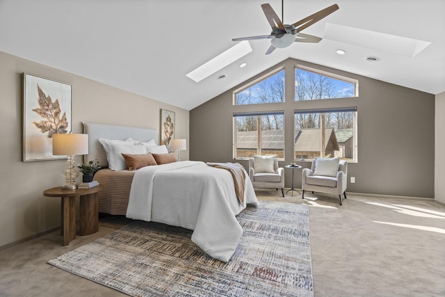 bedroom featuring a skylight, carpet flooring, visible vents, and ceiling fan