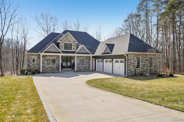 view of front of home with a front yard, concrete driveway, and stone siding