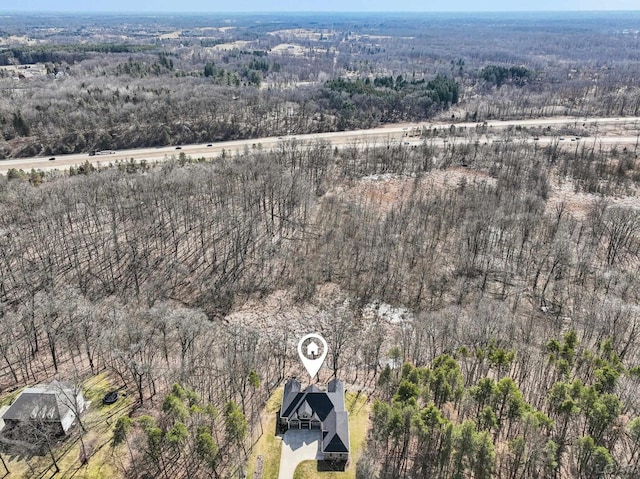 bird's eye view with a view of trees