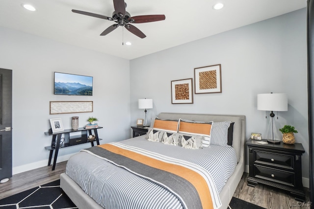 bedroom with recessed lighting, baseboards, wood finished floors, and a ceiling fan